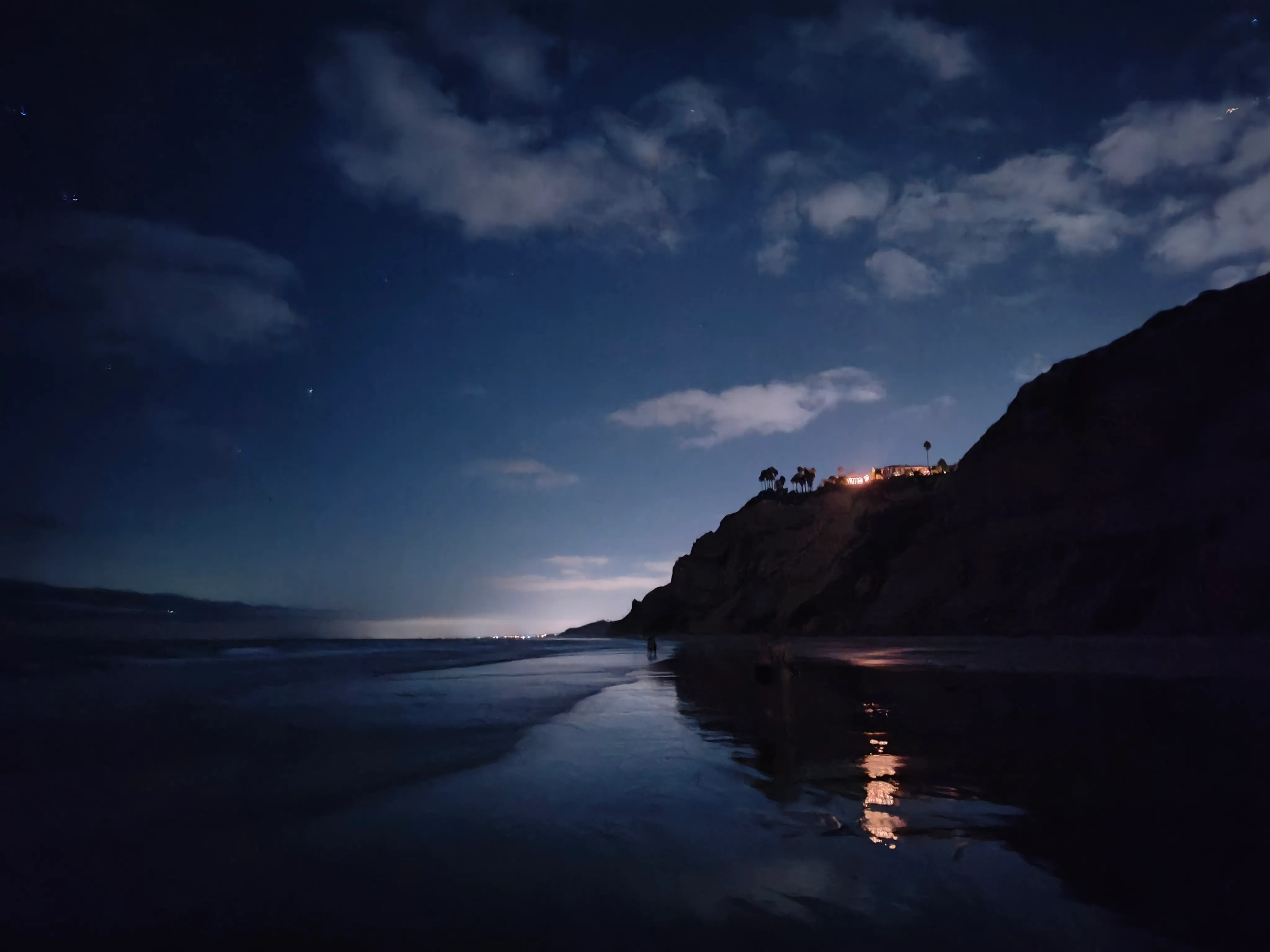 Clouds and moonlight over the coast